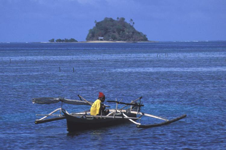 Fisherman on bangka, Northern Sulawesi, Indonesia.
